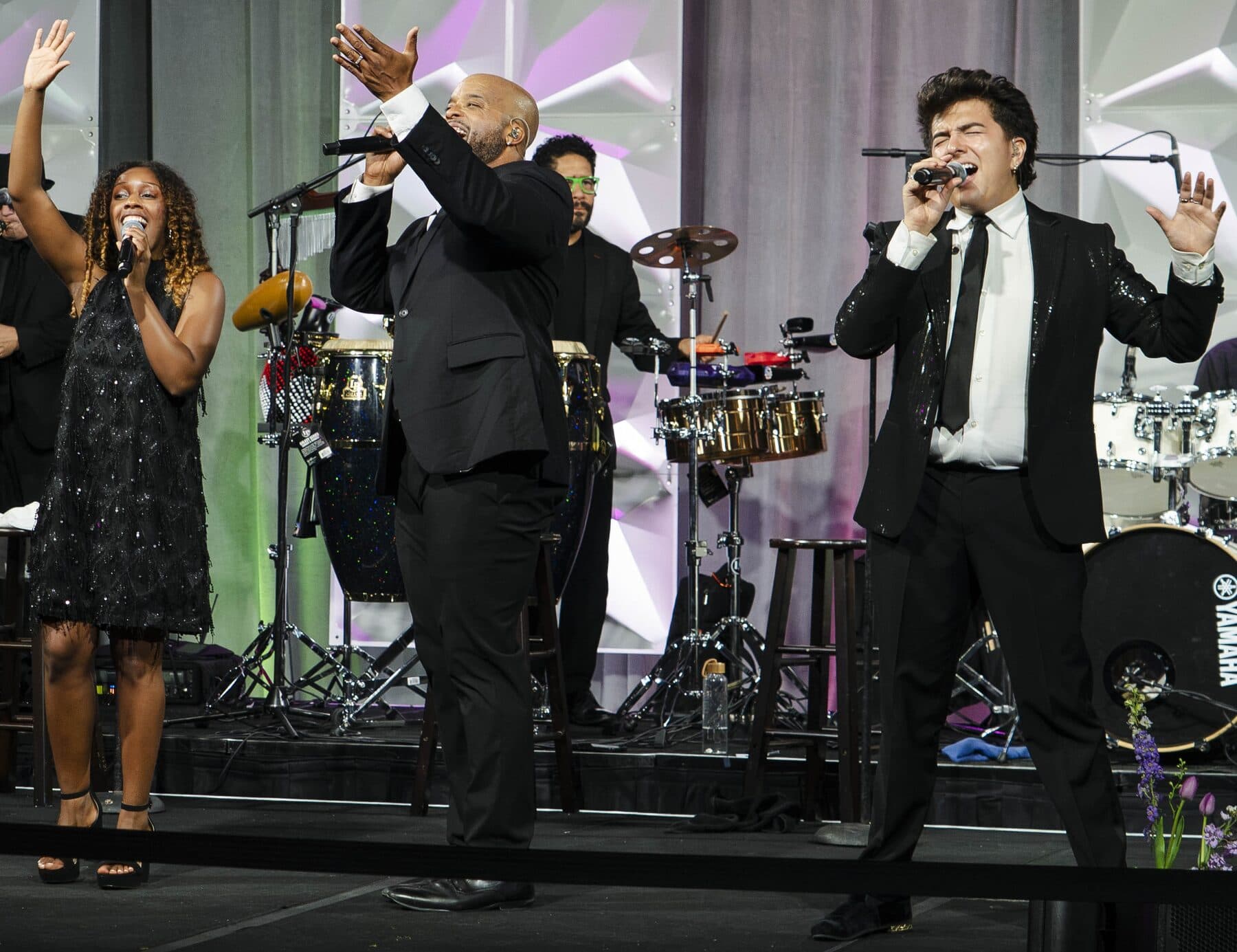 High Rize vocalists and band during an up-tempo number