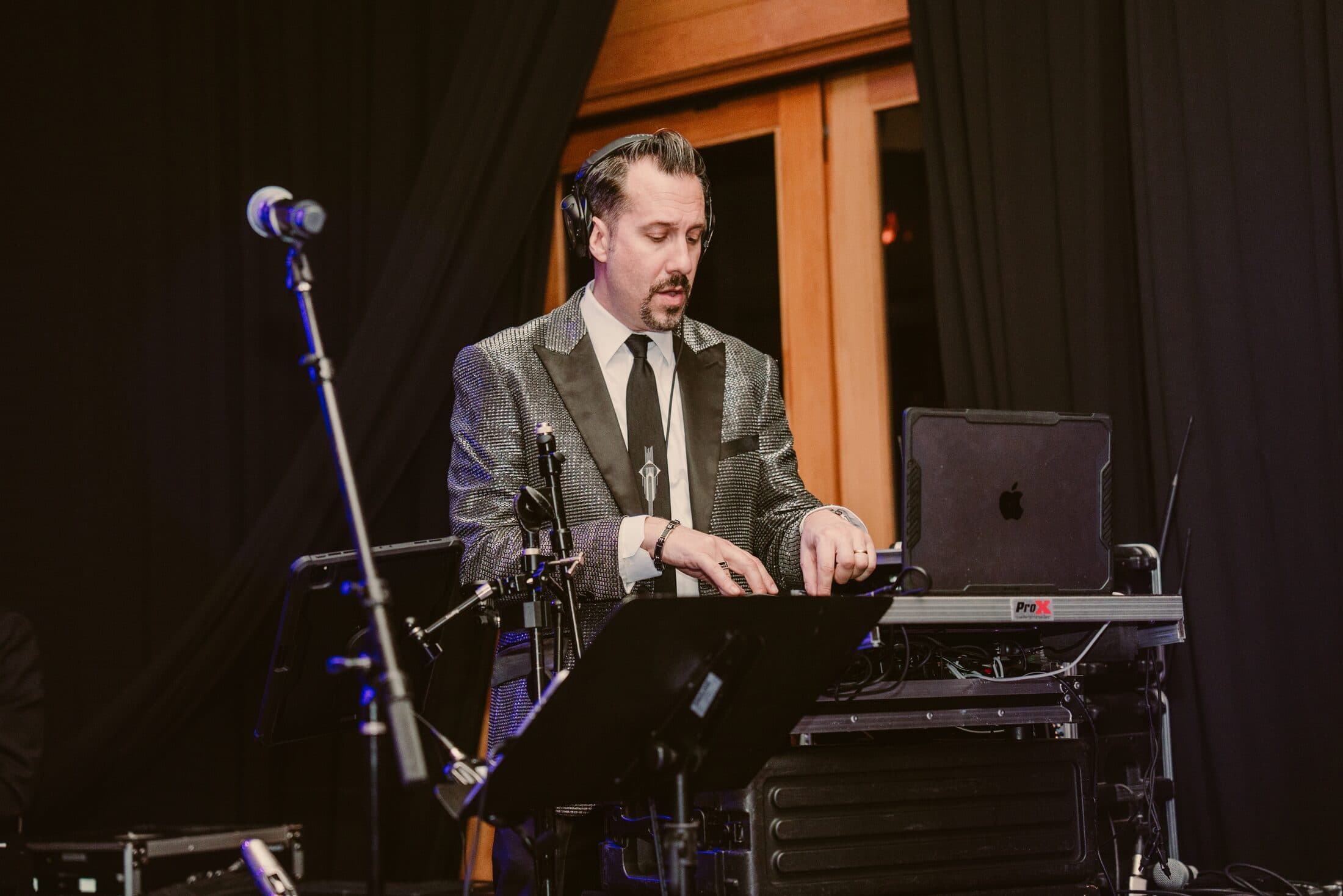 A musician playing quietly during a cocktail hour